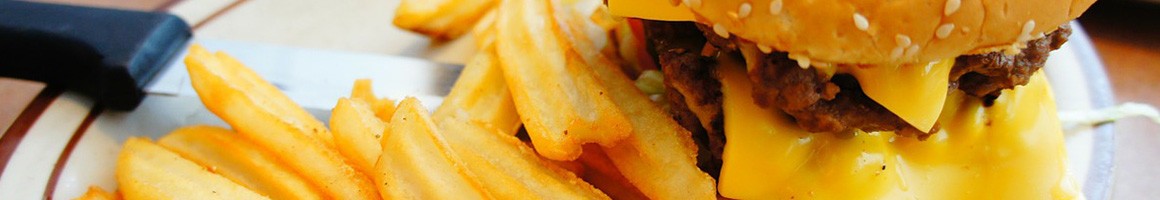 Eating Burger Fast Food Hot Dog at Hot Dog Station restaurant in Chicago, IL.